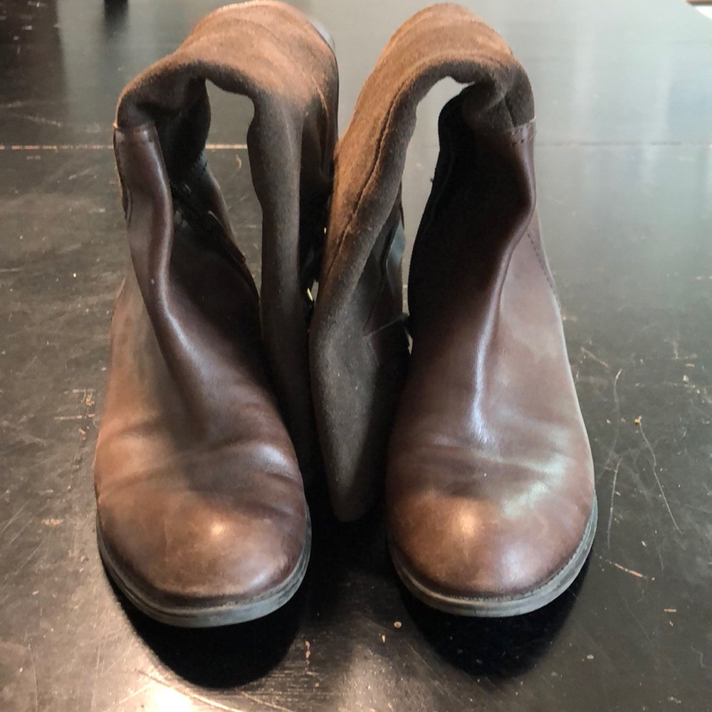 Ralph Lauren brown leather boots with gold buckle detail.